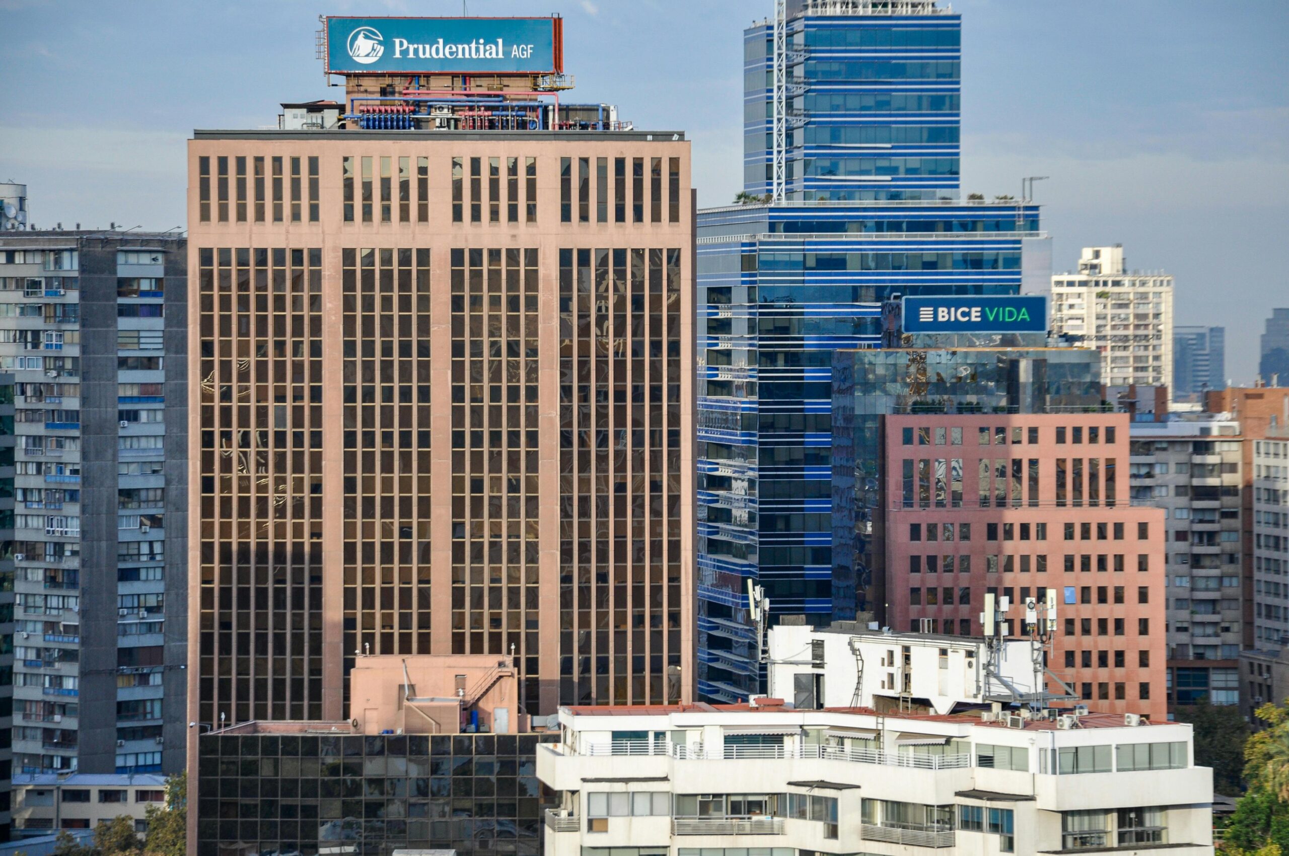 View of Santiago cityscape with towering skyscrapers, including Prudential AGF and Bice Vida buildings.